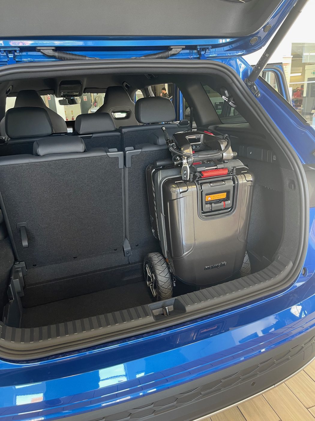 ATTO folding mobility scooter in the boot of a Skoda Kodiaq seven-seat SUV